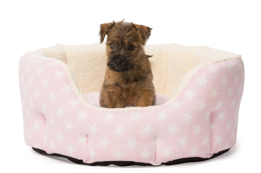 Cama ovalada para cachorros Fleece Star Snuggle, color rosa